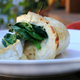Illustration for article titled I saved my brother's date night with this Brie spinach-stuffed chicken